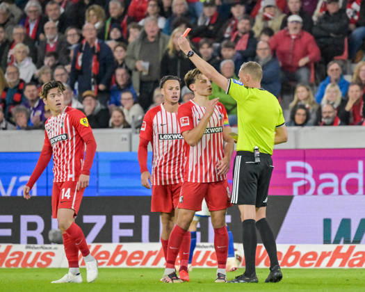 Referee Martin Petersen shows Yuito Suzuki of SC Freiburg, No. 14, a yellow-red card (GER), SC Freiburg vs. Schalke 04, Soccer, Bundesliga, Matchday 5, 2026–2027 season, October 11, 2026 DFL and DFB regulations prohibit any use of photographs as image sequences and or quasi-video GER, SC Freiburg vs. Schalke 04, Soccer, Bundesliga, Matchday 5, 2026–2027 Season, October 11, 2026, Freiburg Copyright: xEibner-Pressefotox EP_THS