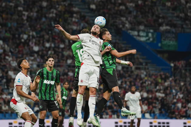 Milan s Adrien Rabiot fights for the ball with Sassuolo™s Nemanja Matic and Sassuolo™s Sebastiano Esposito during the Serie A soccer match between Sassuolo and Milan at the Mapei Stadium in Reggio Emilia, north Italy - Sunday, October 11, 2026 - Copyright: xMassimoxPaolone LaPressex