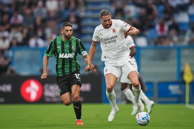Milan s Adrien Rabiot fights for the ball with Sassuolo™s Domenico Berardi during the Serie A soccer match between Sassuolo and Milan at the Mapei Stadium in Reggio Emilia, north Italy - Sunday, October 11, 2026 - Copyright: xMassimoxPaolone LaPressex