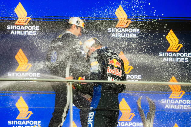 2026 Formula 1 Singapore Grand Prix - Podium CHARLES LECLERC 16 (MON) of Scuderia Ferrari HP (Ferrari SF-26) and MAX VERSTAPPEN 1 (NED) of Oracle Red Bull Racing (Red Bull Racing RB22) champagne celebration on the podium on Sunday Race Day during the Formula 1 Singapore Airlines Singapore Grand Prix 2026 at Marina Bay Street Circuit, Singapore, on October 11, 2026. Photo by Antoine Lapeyre Reveries Agency via ABACAPRESS.COM Singapore Singapore Copyright: xAntoinexLapeyre ReveriesxAgency ABACAx
