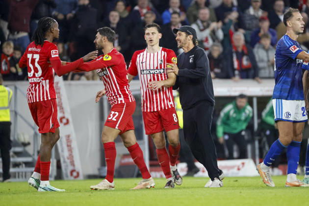 Jordy Makengo, SC Freiburg, 33; Vincenzo Grifo, SC Freiburg, 32; Maximilian Eggestein, SC Freiburg, 08; and Julian Schuster, SC Freiburg, coach after the game; Germany, soccer, Bundesliga 1, Matchday 5, 2026–2027, SC Freiburg vs. FC Schalke 04, October 11, 2026, Freiburg im Breisgau, Europa-Park Stadium, Germany Copyright: xGrantxHubbsx
