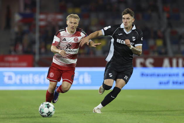 Andreas Mueller of Fortuna Düsseldorf and Tim Heike of SC Verl battle for the ball during the 3. Liga match between Fortuna Düsseldorf and SC Verl at the Merkur Spiel Arena on October 11, 2026, in Düsseldorf, Germany. Photo by Oliver Kaelke, DeFodi Images. Andreas Mueller of Fortuna Düsseldorf and Tim Heike of SC Verl battle for the ball during the 3. Liga match between Fortuna Düsseldorf and SC Verl at Merkur Spiel Arena on October 11, 2026 in Düsseldorf, Germany. Photo by Oliver Kaelke, DeFodi Images. DFB and DFL regulations prohibit any use of photographs as image sequences and or quasi-video. Photo by Oliver Kaelke, DeFodi Images.
