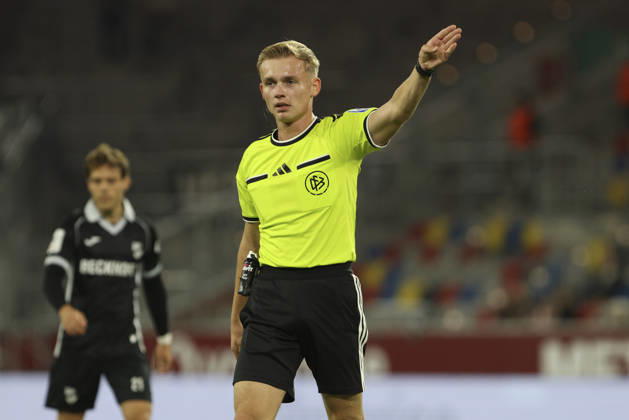 Referee Sebastian Hilsberg gestures during the 3. Liga match between Fortuna Düsseldorf and SC Verl at the Merkur Spiel Arena on October 11, 2026, in Düsseldorf, Germany. Photo by Oliver Kaelke, DeFodi Images. Referee Sebastian Hilsberg gestures during the 3. Liga match between Fortuna Düsseldorf and SC Verl at Merkur Spiel Arena on October 11, 2026 in Düsseldorf, Germany. Photo by Oliver Kaelke, DeFodi Images. DFB and DFL regulations prohibit any use of photographs as image sequences and or quasi-video. Photo by Oliver Kaelke, DeFodi Images.