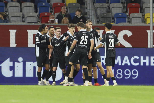 Tim Heike of SC Verl celebrates the goal with his teammates after the score was tied at 1–1 during the 3. Liga match between Fortuna Düsseldorf and SC Verl at the Merkur Spiel Arena on October 11, 2026, in Düsseldorf, Germany. Photo by Oliver Kaelke, DeFodi Images. Tim Heike of SC Verl celebrates after scoring his team’s first goal with teammates during the 3. Liga match between Fortuna Düsseldorf and SC Verl at Merkur Spiel Arena on October 11, 2026 in Düsseldorf, Germany. Photo by Oliver Kaelke, DeFodi Images. DFB and DFL regulations prohibit any use of photographs as image sequences and or quasi-video. Photo by Oliver Kaelke, DeFodi Images.