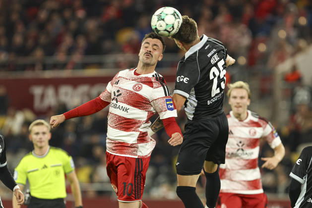 Philipp Foerster of Fortuna Düsseldorf and Tim Heike of SC Verl battle for the ball during the 3. Liga match between Fortuna Düsseldorf and SC Verl at the Merkur Spiel Arena on October 11, 2026, in Düsseldorf, Germany. Photo by Oliver Kaelke, DeFodi Images. Philipp Foerster of Fortuna Düsseldorf and Tim Heike of SC Verl battle for the ball during the 3. Liga match between Fortuna Düsseldorf and SC Verl at Merkur Spiel Arena on October 11, 2026 in Düsseldorf, Germany. Photo by Oliver Kaelke, DeFodi Images. DFB and DFL regulations prohibit any use of photographs as image sequences and or quasi-video. Photo by Oliver Kaelke, DeFodi Images.