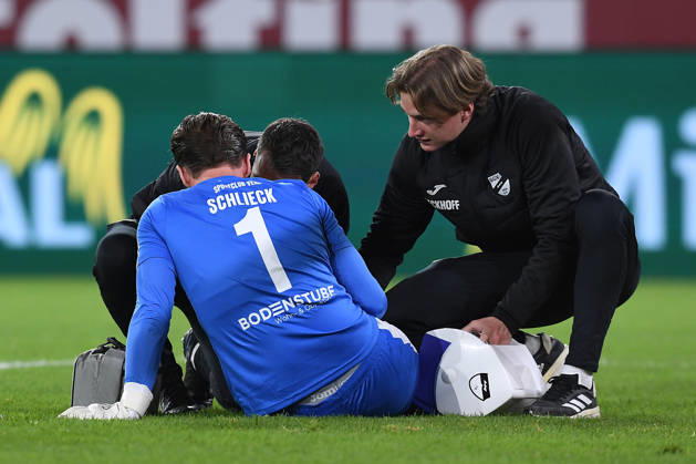 Soccer, 3rd Division, Matchday 8: Fortuna Düsseldorf vs. SC Verl on October 11, 2026, at the Merkur Spiel Arena in Düsseldorf. Timo Schlieck of Verl lies injured on the ground. DFB regulations prohibit any use of photographs as image sequences and or quasi-video. xRx
