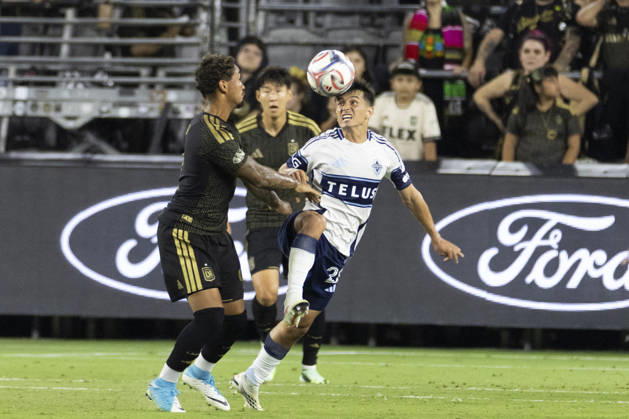 October 10, 2026, Los Angeles, California, USA: Vancouver Whitecaps defensive midfielder Andres Cubas (20) and Los Angeles FC right midfielder Armindo Sieb (9) in actions during a MLS, Fussball Herren, USA soccer game on Saturday, Oct. 10, 2026 in Los Angeles. Los Angeles USA - ZUMAc68_ 20261010_zaf_c68_094 Copyright: xRingoxChiux