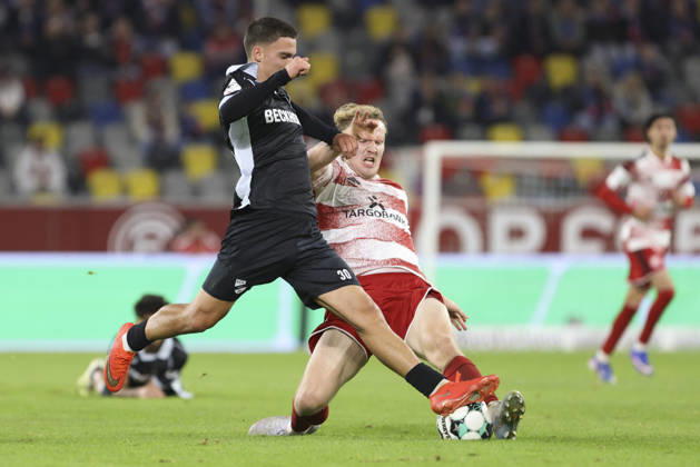 Almin Mesanovic of SC Verl and Lukas Bornschein of Fortuna Düsseldorf battle for the ball during the 3. Liga match between Fortuna Düsseldorf and SC Verl at the Merkur Spiel Arena on October 11, 2026, in Düsseldorf, Germany. Photo by Oliver Kaelke, DeFodi Images. Almin Mesanovic of SC Verl and Lukas Bornschein of Fortuna Düsseldorf battle for the ball during the 3. Liga match between Fortuna Düsseldorf and SC Verl at Merkur Spiel Arena on October 11, 2026 in Düsseldorf, Germany. Photo by Oliver Kaelke, DeFodi Images. DFB and DFL regulations prohibit any use of photographs as image sequences and or quasi-video. Photo by Oliver Kaelke, DeFodi Images.