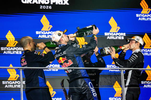 F1 - SINGAPORE GRAND PRIX 2026 LAMBIASE Gianpiero, Head of Race Engineering at Red Bull Racing, portrait, VERSTAPPEN Max (nld), Red Bull Racing Ford RB22, portrait LECLERC Charles (mco), Scuderia Ferrari SF-26, portrait Moet Chandon podium during the 2026 Formula 1 Singapore Grand Prix, 17th round of the 2026 Formula One World Championship, WM, Weltmeisterschaft from October 9 to 11, 2026 on the Marina Bay Street Circuit, in Singapore, Singapore - SingaporeSingapore  Copyright: xALBERTOxVIMERCATIx