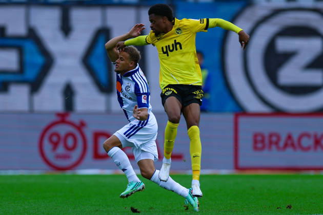 GC Zurich vs. BSC Young Boys, Brack Super League, October 11, 2026: Kenzo Goudmijn (24), Grasshopper Club Zurich, left, in a tackle with Alan Virginius (7), BSC Young Boys in the Brack Super League match between Grasshopper Club Zurich (GCZ) and BSC Young Boys (YB) on October 11, 2026, at Letzigrund Stadium in Zurich, Switzerland Zurich Letzigrund Stadium Zurich Switzerland