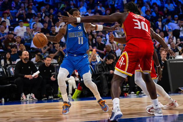 (261011) -- MACAO, Oct. 11, 2026 -- Kyrie Irving (L) of Dallas Mavericks dribbles during the 2026-2027 NBA, Basketball Herren, USA preseason game between Dallas Mavericks and Houston Rockets in Macao, south China, on Oct. 11, 2026. ) (SP)CHINA-MACAO-BASKETBALL-NBA PRESEASON-ROCKETS VS MAVERICKS (CN) CheongxKamxKa 