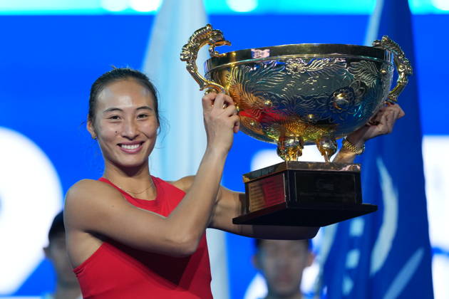 (261011) -- BEIJING, Oct. 11, 2026 -- Zheng Qinwen poses with the trophy during the awarding ceremony after the women s singles final between Zheng Qinwen of China and Mirra Andreeva of Russia at 2026 China Open tennis tournament in Beijing, China, Oct. 11, 2026. ) (SP)CHINA-BEIJING-TENNIS-CHINA OPEN-WOMEN S SINGLES-FINAL (CN) SunxFei