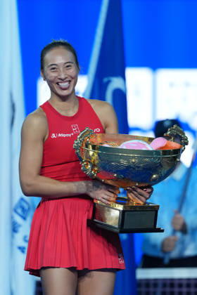 (261011) -- BEIJING, Oct. 11, 2026 -- Zheng Qinwen poses with the trophy during the awarding ceremony after the women s singles final between Zheng Qinwen of China and Mirra Andreeva of Russia at 2026 China Open tennis tournament in Beijing, China, Oct. 11, 2026. ) (SP)CHINA-BEIJING-TENNIS-CHINA OPEN-WOMEN S SINGLES-FINAL (CN) SunxFei