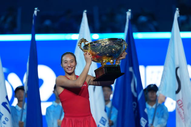 (261011) -- BEIJING, Oct. 11, 2026 -- Zheng Qinwen poses with the trophy during the awarding ceremony after the women s singles final between Zheng Qinwen of China and Mirra Andreeva of Russia at 2026 China Open tennis tournament in Beijing, China, Oct. 11, 2026. ) (SP)CHINA-BEIJING-TENNIS-CHINA OPEN-WOMEN S SINGLES-FINAL (CN) SunxFei