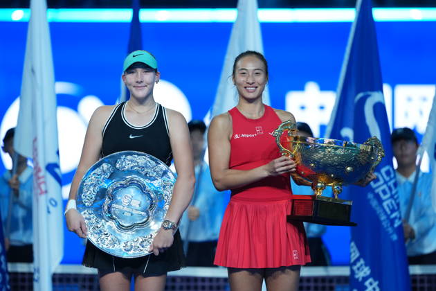 (261011) -- BEIJING, Oct. 11, 2026 -- Zheng Qinwen (R) and Mirra Andreeva pose with their trophies during the awarding ceremony after the women s singles final between Zheng Qinwen of China and Mirra Andreeva of Russia at 2026 China Open tennis tournament in Beijing, China, Oct. 11, 2026. ) (SP)CHINA-BEIJING-TENNIS-CHINA OPEN-WOMEN S SINGLES-FINAL (CN) SunxFei