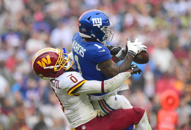 LANDOVER, MD - OCTOBER 11: Giants wide receiver Malik Nabers (1) catches a touchdown pass in the end zone to tie the game with 1:43 left in the fourth quarter while Washington cornerback Mike Sainristril (0) defends him during the New York Giants versus Washington Commanders National Football League game at Northwest Stadium on October 11, 2026 in Landover, MD. (Photo by Randy Litzinger Icon Sportswire) NFL, American Football Herren, USA OCT 11 Giants at Commanders EDITORIAL USE ONLY Icon9662610111344