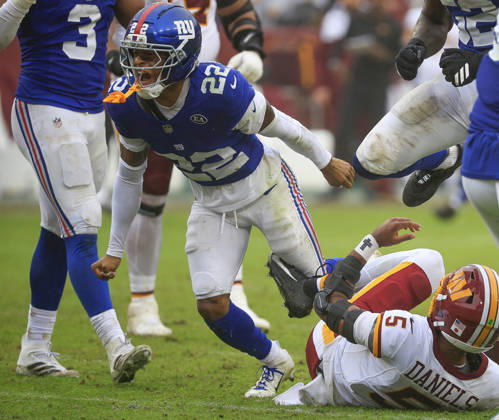 October 11, 2026: Washington Commanders QB 5 Jayden Daniels is sacked by New York Giants DB 22 Andru Phillips during the Washington Commanders game against the New York Giants at Northwest Stadium in Landover, MD. CSM NFL, American Football Herren, USA 2026: Washington Commanders Vs New York Giants OCT 11  - ZUMAc04_ 20261011_zma_c04_115 Copyright: xJustinxCooperx