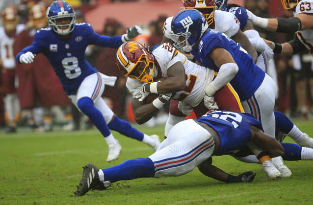 October 11, 2026: Washington Commanders RB 22 Jacory Croskey-Merritt is tackled by New York Giants CB 2 Deonte Banks during the Washington Commanders game against the New York Giants at Northwest Stadium in Landover, MD. CSM NFL, American Football Herren, USA 2026: Washington Commanders Vs New York Giants OCT 11  - ZUMAc04_ 20261011_zma_c04_117 Copyright: xJustinxCooperx