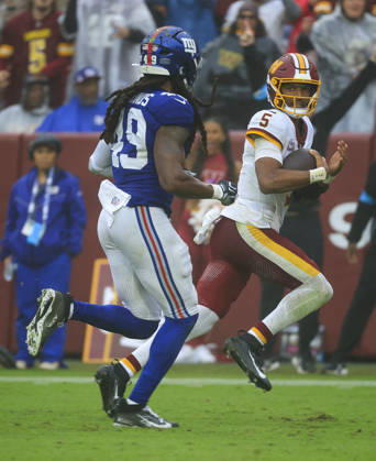 October 11, 2026: Washington Commanders QB 5 Jayden Daniels runs for a touchdown during the Washington Commanders game against the New York Giants at Northwest Stadium in Landover, MD. CSM NFL, American Football Herren, USA 2026: Washington Commanders Vs New York Giants OCT 11  - ZUMAc04_ 20261011_zma_c04_122 Copyright: xJustinxCooperx