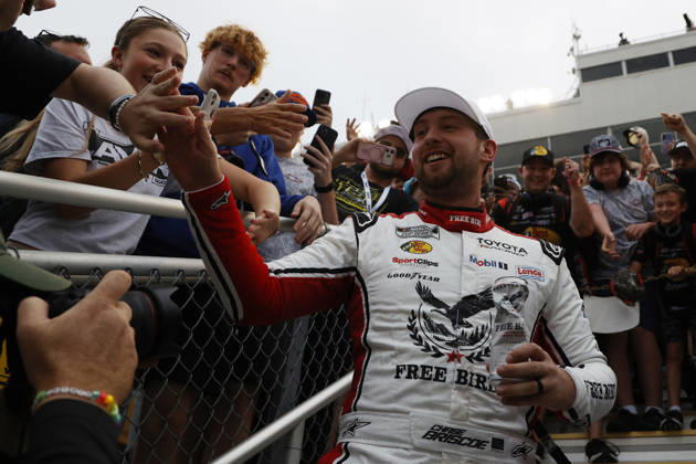 CHARLOTTE, NC - OCTOBER 11: Chase Briscoe ( 19 Joe Gibbs Racing Freebird Spring Water Toyota) celebrates after winning the NASCAR, Motorsport, USA Cup Series Playoffs Bank of America 400 race on October 11, 2026 at Charlotte Motor Speedway in Charlotte, NC. (Photo by Jeff Robinson Icon Sportswire) AUTO: OCT 11 NASCAR Cup Series Playoffs Bank of America 400 EDITORIAL USE ONLY Icon2610112000400