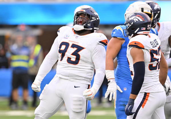 INGLEWOOD, CA - OCTOBER 11: Denver Broncos defensive tackle D.J. Jones (93) celebrates after getting the sack on Los Angeles Chargers quarterback Justin Herbert (10) during the game between the Los Angeles Chargers and the Denver Broncos on October 11, 2026 at SoFi Stadium in Inglewood. (Photo by David Dennis Icon Sportswire) NFL, American Football Herren, USA OCT 11 Broncos at Chargers EDITORIAL USE ONLY Icon26101149