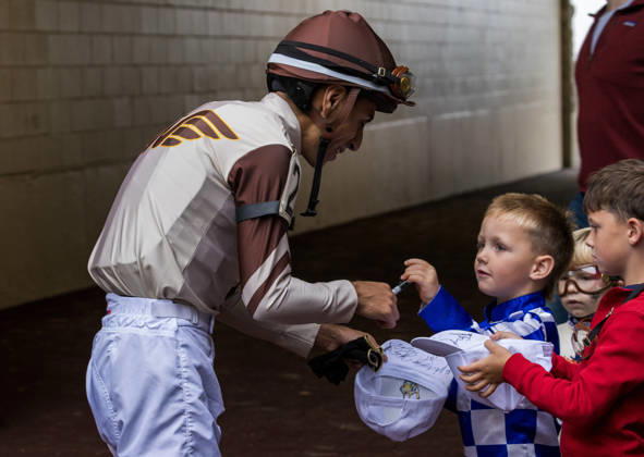 HORSE RACING 2026: Franklin Stakes Day Keeneland OCT 11 October 11, 2026, Lexington, Ky, USA: Jockey Emmanuel Esquivel with a group of young fans on Franklin Stakes Day on October 11, 2026. Candice Chavez Eclipse Sportswire CSM(Credit Image: Â {Serial Cal Media) Lexington Ky USA EDITORIAL USE ONLY Copyright: xx ZUMA-20261011_faf_cs17_023.jpg {Serialx csmphotothree533791