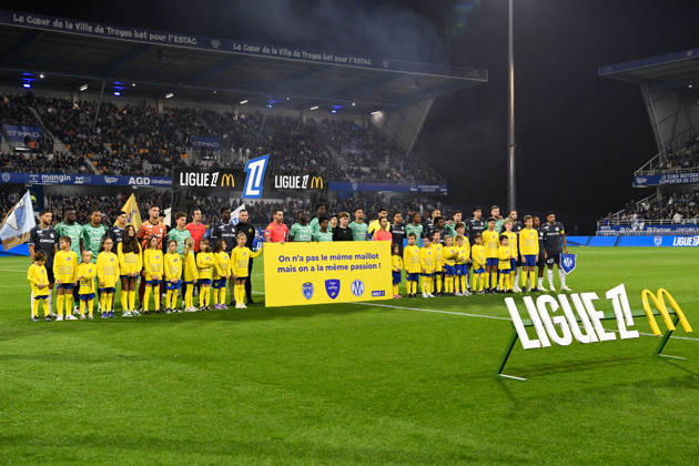 ESTAC Troyes v Olympique de Marseille - Ligue 1 McDonald s 2026 2027 Team of Troyes and Team of Marseille display a banner : display a banner ; On n a pas le meme maillot mais on a la meme passion ! during Ligue 1 McDonald s match between Troyes and Marseille at Stade de l Aube on October 11, 2026 in Troyes, France. Troyes France  Copyright: xEwenxGavetx 776573381