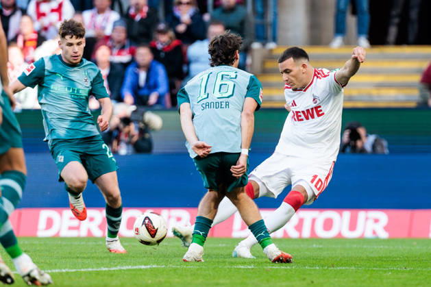 KOELN, GERMANY - OCTOBER 11: Said El Mala (1. FC Koeln, 10) shooting the ball against Philipp Sander (Borussia Moenchengladbach, 16) during the Bundesliga match between 1. FC Koeln vs. Borussia Moenchengladbach at Rheinenergie-Stadion on matchday 5 of the 1. Bundesliga on October 11, 2026 in Koeln, Germany. DFL REGULATIONS PROHIBIT ANY USE OF PHOTOGRAPHS AS IMAGE SEQUENCES AND OR QUASI-VIDEO. North Rhine Westphalia Germany Copyright: xSteffiexWunderlx