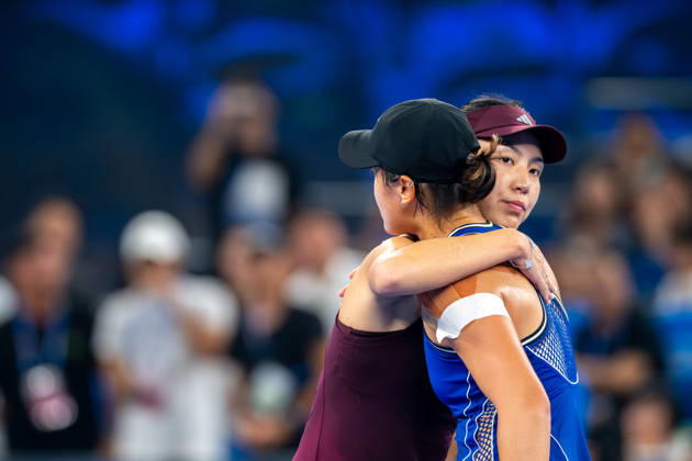 (261012) -- WUHAN, Oct. 12, 2026 -- Wang Xiyu (L) greets Wang Xinyu after the women s sinlges round of 64 match between Wang Xiyu of China and Wang Xinyu of China of the 2026 Wuhan Open tennis tournament in Wuhan, capital of central China s Hubei Province, Oct. 12, 2026. ) (SP)CHINA-WUHAN-TENNIS-WUHAN OPEN-WOMEN S SINGLES-ROUND OF 64 (CN) DuxZixuan 