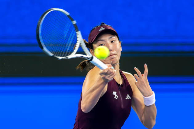 (261012) -- WUHAN, Oct. 12, 2026 -- Wang Xinyu hits a return during the women s sinlges round of 64 match between Wang Xiyu of China and Wang Xinyu of China of the 2026 Wuhan Open tennis tournament in Wuhan, capital of central China s Hubei Province, Oct. 12, 2026. ) (SP)CHINA-WUHAN-TENNIS-WUHAN OPEN-WOMEN S SINGLES-ROUND OF 64 (CN) DuxZixuan 