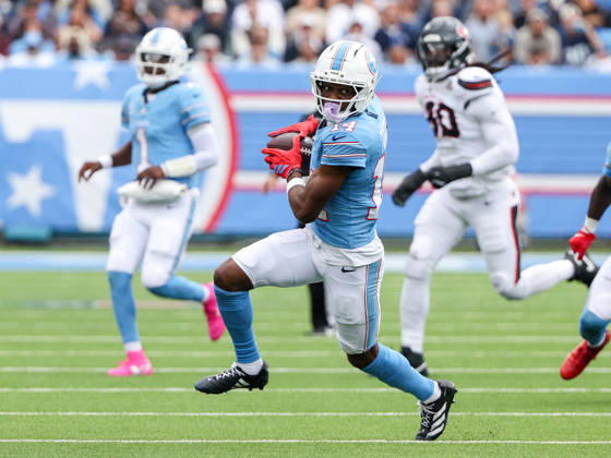 Oct 11, 2026; Nashville, TN, USA; Tennessee Titans wide receiver Carnell Tate (14) runs with the ball after making a reception during the NFL, American Football Herren, USA regular season game between the Houston Texans and Tennessee Titans at Nissan Stadium. Mandatory Credit: -Cal Media NFL 2026: Texans Vs Titans OCT 11 - ZUMAc04_ 20261011_zma_c04_339 Copyright: xStephenxFurstx