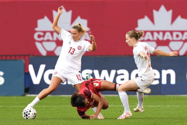 October 12, 2026, Toronto, On, CANADA: Canada s Olivia Smith, centre, is fouled by Denmark s Sara Thrige as Olivia Holdt, left, as collects the ball during first half International Friendly, Länderspiel, Nationalmannschaft action, in Toronto, on Monday Oct. 12, 2026. Canada News - October 12, 2026 - ZUMAc35_ 20261012_zaf_c35_058 Copyright: xChrisxYoungx