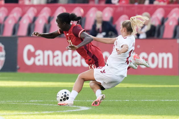 October 12, 2026, Toronto, On, CANADA: Canada s Simi Awujo, left, is fouled by Denmark s Olivia Holdt during first half International Friendly, Länderspiel, Nationalmannschaft action, in Toronto, on Monday Oct. 12, 2026. Canada News - October 12, 2026 - ZUMAc35_ 20261012_zaf_c35_061 Copyright: xChrisxYoungx