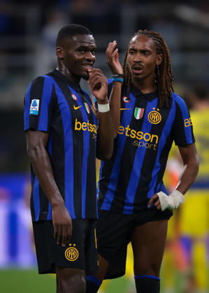 FC Internazionale v Parma Calcio 1913 - Serie A - Season 2026-2027 Milan, Italy, 10th October 2026. Djed Spence of FC Internazionale reacts with team mate Ange-Yoan Bonny following the FC Internazionale vs Parma Calcio 1913 Serie A match at Giuseppe Meazza, Milan. Picture credit should read: Jonathan Moscrop Milan Stadio Giuseppe Meazza Italy