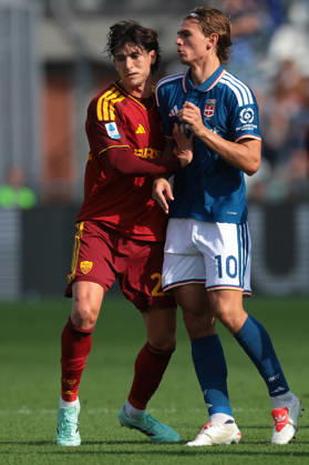Como 1907 v AS Roma - Serie A - Season 2026-2027 Como, Italy, 11th October 2026. Leonardo Balerdi of AS Roma tussles with Nico Paz of Como 1907 during the Como 1907 vs AS Roma Serie A match at Stadio Giuseppe Sinigaglia, Como. Picture credit should read: Jonathan Moscrop Como Stadio Giuseppe Sinigaglia Italy