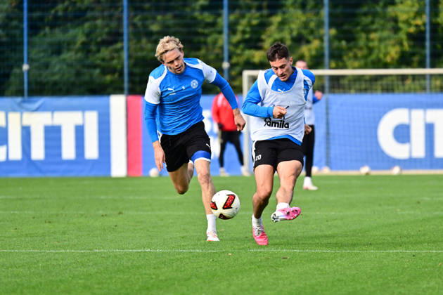 October 13, 2026, Soccer, Men s, 2nd Bundesliga, 2026–2027 Season, Holstein Kiel Practice, KSV Adrian Kapralik takes a shot against Noah Madsen in Kiel, near Holstein Stadium Projensdorf, Training Center, Northern Schleswig-Holstein, Germany