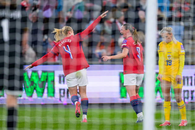 October 13, 2013: Julie Blakstad and Elisabeth Terland of Norway celebrate after scoring 3-0, while Olga Iordachiusi of Romania looks dejected during the FIFA Women’s World Cup Qualifier soccer match between Norway and Romania on October 13, 2026 in Oslo. Photo by Marius Simensen, BILDBYRÅN COP 238 MM0076 bbeng women s soccer football soccer FIFA World Cup qualifiers World Cup qualifiers women s World Cup qualifiers international match Norway Romania celebration dejection  Copyright: MARIUSxSIMENSEN BB261013BB378
