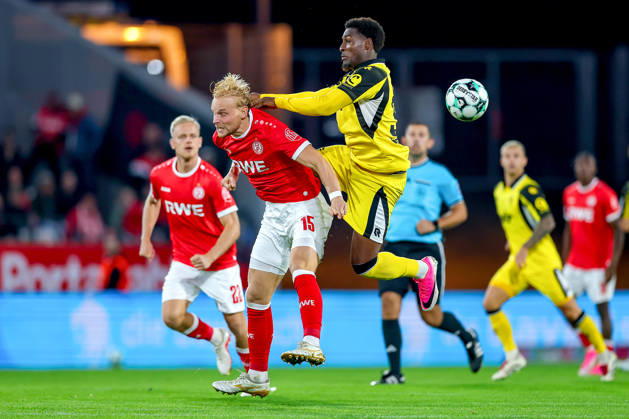 October 13, 2026, Soccer, 3rd Division, Rot Weiss Essen vs. SC Fortuna Köln, Hafenstraße Stadium, Matchday 9, 2026–27 Season: Ben Hüning (RWE 15) in a tackle against Romeo Aigbekaen (SC Fortuna Köln 30). DFB regulations prohibit any use of photographs as image sequences and or quasi-video. North Rhine-Westphalia, Germany
