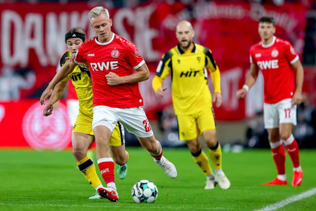 October 13, 2026, Soccer, 3rd Division, Rot Weiss Essen vs. SC Fortuna Köln, Hafenstraße Stadium, Matchday 9, 2026–27 Season: Janne Sietan (RWE 22) in a tackle against Bennit Bröger (SC Fortuna Köln 38). DFB regulations prohibit any use of photographs as image sequences and or quasi-video. North Rhine-Westphalia, Germany