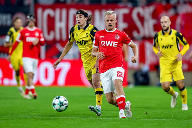 October 13, 2026, Soccer, 3rd Division, Rot Weiss Essen vs. SC Fortuna Köln, Hafenstraße Stadium, Matchday 9, 2026–27 Season: Janne Sietan (RWE 22) in a tackle against Bennit Bröger (SC Fortuna Köln 38). DFB regulations prohibit any use of photographs as image sequences and or quasi-video. North Rhine-Westphalia, Germany