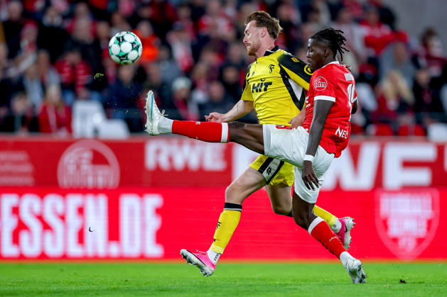 October 13, 2026, Soccer, 3rd Division, Rot Weiss Essen vs. SC Fortuna Köln, Hafenstraße Stadium, Matchday 9, 2026–27 Season: Franci Bouebari (RWE 19) in a tackle against Jannik Mause (SC Fortuna Köln 37). DFB regulations prohibit any use of photographs as image sequences and or quasi-video. North Rhine-Westphalia, Germany