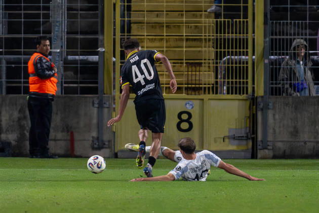 Battle for the Ball: Tackle between Michael Eberwein (TSV 1860 Munich, 13) and Micah Ham (SpVgg Bayreuth, 40) GER, TSV 1860 Munich vs. SpVgg Oberfranken Bayreuth, soccer, Bavarian Regional League, Matchday 14, 2026–2027 season, October 13, 2026 DFL and DFB regulations prohibit any use of photographs as image sequences and or quasi-video. Photo: HMB Media, Heike Feiner Copyright: HMBxMedia HeikexFeiner