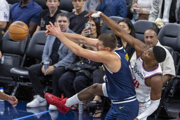 October 14, 2026, Inglewood, California, USA: Los Angeles Clippers Rui Hachimura (28) and Denver Nuggets Nikola JokiÄ¡ (15) vie for the ball During an NBA, Basketball Herren, USA preseason game at Intuit Dome on Wednesday, Oct. 14, 2026 in Inglewood Calf. NBA 2026: Clippers Vs Nuggets  - ZUMAc68_ 20261014_zaf_c68_003 Copyright: xRingoxChiux