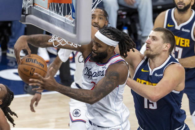 October 14, 2026, Inglewood, California, USA: Los Angeles Clippers Isaiah Jackson (23) and Nikola JokiÄ¡ (15) vie for the ball during an NBA, Basketball Herren, USA preseason game at Intuit Dome on Wednesday, Oct. 14, 2026 in Inglewood Calf. NBA 2026: Clippers Vs Nuggets  - ZUMAc68_ 20261014_zaf_c68_004 Copyright: xRingoxChiux