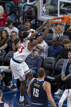 October 14, 2026, Inglewood, California, USA: Los Angeles Clippers Isaiah Jackson (23) dunks against Denver Nuggets Nikola JokiÄ¡ (15) during an NBA, Basketball Herren, USA preseason game at Intuit Dome on Wednesday, Oct. 14, 2026 in Inglewood Calf. NBA 2026: Clippers Vs Nuggets  - ZUMAc68_ 20261014_zaf_c68_016 Copyright: xRingoxChiux