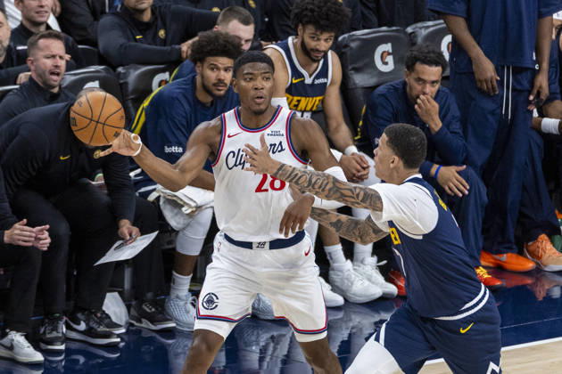 October 14, 2026, Inglewood, California, USA: Los Angeles Clippers Rui Hachimura (28) is defended by Denver Nuggets Trevon Brazile (7) during an NBA, Basketball Herren, USA preseason game at Intuit Dome on Wednesday, Oct. 14, 2026 in Inglewood Calf. NBA 2026: Clippers Vs Nuggets  - ZUMAc68_ 20261014_zaf_c68_018 Copyright: xRingoxChiux