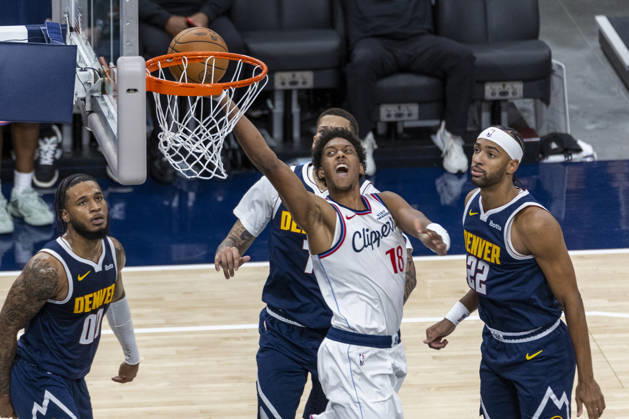 October 14, 2026, Inglewood, California, USA: Los Angeles Clippers Baba Miller (18) goes to the basket against Denver Nuggets during an NBA, Basketball Herren, USA preseason game on Wednesday, Oct. 14, 2026 in Inglewood Calf. NBA 2026: Clippers Vs Nuggets  - ZUMAc68_ 20261014_zaf_c68_029 Copyright: xRingoxChiux