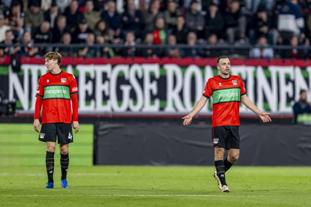 NIJMEGEN — NEC Nijmegen defender Perr Schuurs and NEC Nijmegen midfielder Darko Nejaömic look dejected during the UEFA Europa League match between NEC and Levski Sofia at Stadion De Goffert on October 15, 2026, in Nijmegen, Netherlands. Photo by DeFodi Images