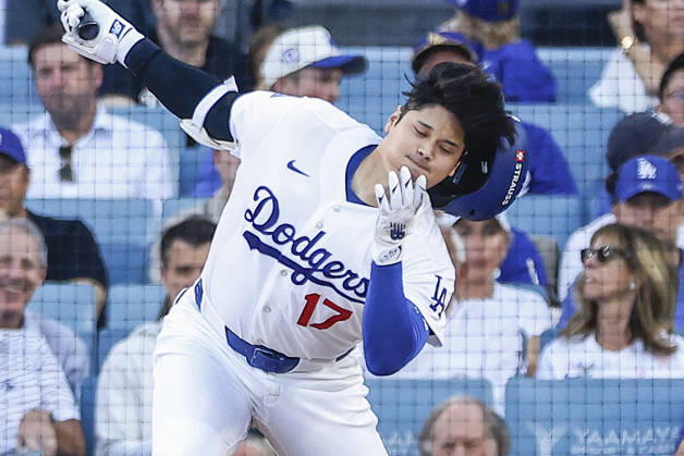 Los Angeles Dodgers designated hitter Shohei Ohtani (17) strikes out swinging against the Milwaukee Brewers in the first inning during game four of the MLB, Baseball Herren, USA National League Championship Series at Dodger Stadium in Los Angeles, California, on Thursday, October 15, 2026.  LAP20261015704 CAROLINExBREHMAN