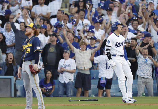 Los Angeles Dodgers designated hitter Shohei Ohtani (17) celebrates after hitting a three-run home run as Milwaukee Brewers pitcher Dustin May (21) watches the ball in the second inning during game four of the MLB, Baseball Herren, USA National League Championship Series at Dodger Stadium in Los Angeles, California, on Thursday, October 15, 2026.  LAP20261015734 CAROLINExBREHMAN